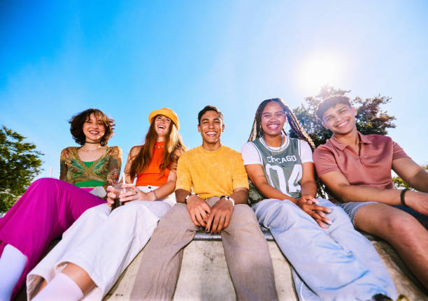 istock Five friends smiling towards camera in skatepark, low angle view 2192497007