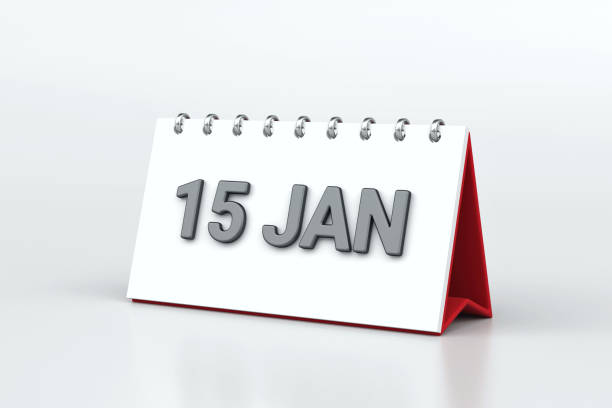 istock Minimal desk calendar displaying 15 JAN in bold metallic lettering on white page with red accents, set against clean white background, 3d rendering 2192499834
