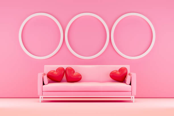 Valentine's Day concept with pink sofa, blank frames and heart shaped pillows. Digitally generated image. 3d render.