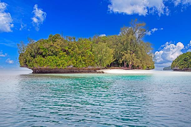istock Floating rock islands in turquoise ocean with lush greenery 2192502172