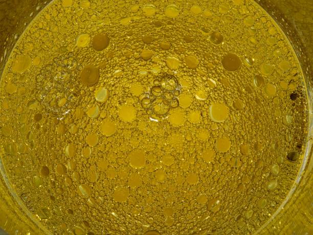 istock Yellow Olive Oil Bubbles In Water. 2192503385