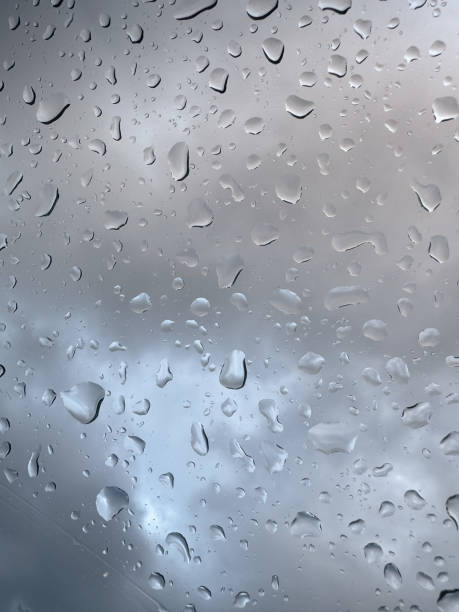 istock Close-up of raindrops on a window 2192505185