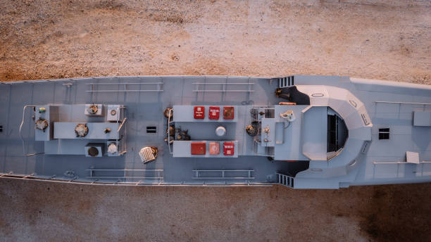 A detailed aerial view of fire safety boxes and equipment on a ship's deck, emphasizing safety and organization in maritime environments