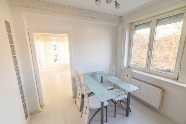 istock Bright Minimalist Dining Room with Large Windows 2192506285