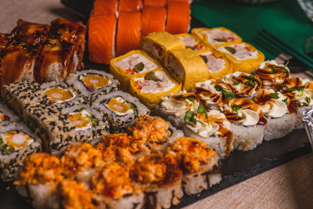 istock A set of sushi and rolls on the festive table 2192506386