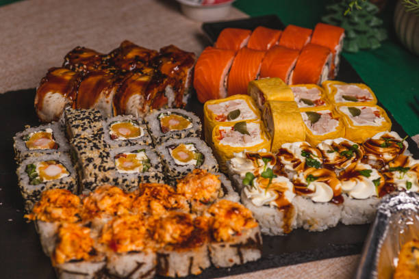 istock A set of sushi and rolls on the festive table 2192506414