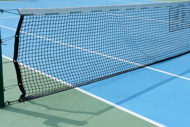 istock tennis net on tennis court 2192508549