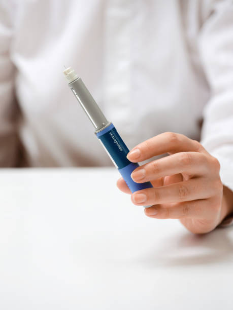 istock Female hands holding Semaglutide injection pen. 2192521590