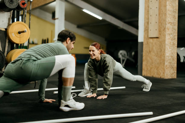 istock Friends training together in the gym 2192523648