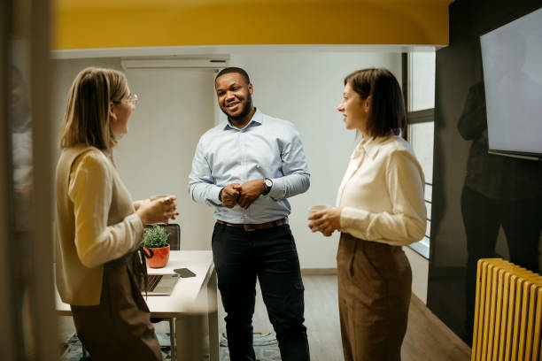 istock Colleagues standing in the office 2192524249