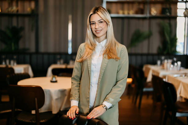 istock Female business owner at a restaurant 2192525026