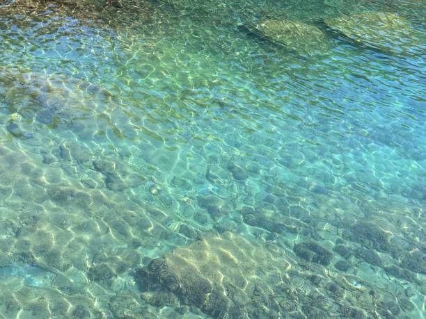 istock Mediterranean sea transparent water with underwater stones and pebbles 2192526486