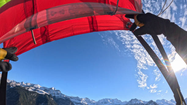 istock Personal perspective of skydiver sailing through sky 2192526491