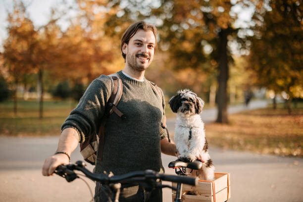 istock Man and dog in the park 2192526615