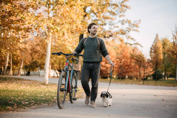 istock Man and dog in the park 2192526620
