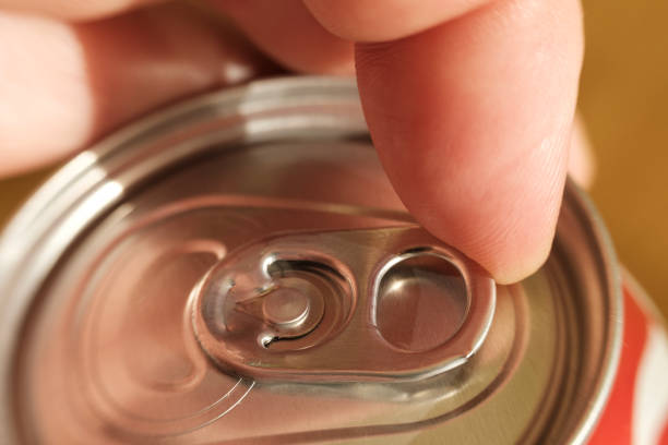 istock Finger opening aluminum can top: refreshing beverage awaits 2192529279