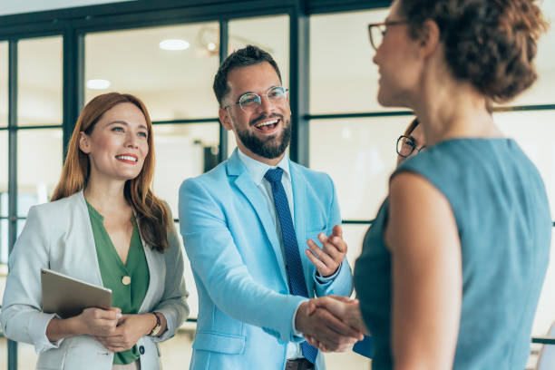 istock Business people shaking hands in the office 2192529889