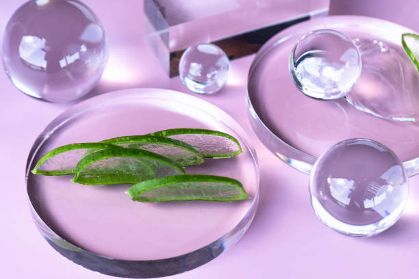 Serene spa setting with aloe and centella products showcased in elegant glass display