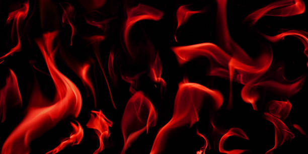 istock Various flames from a fire in red against a black background 2192536767
