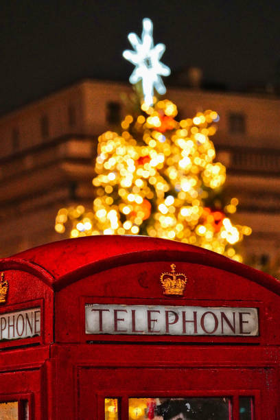 istock St James's Christmas tree London Red phone box, England, UK 2192537460