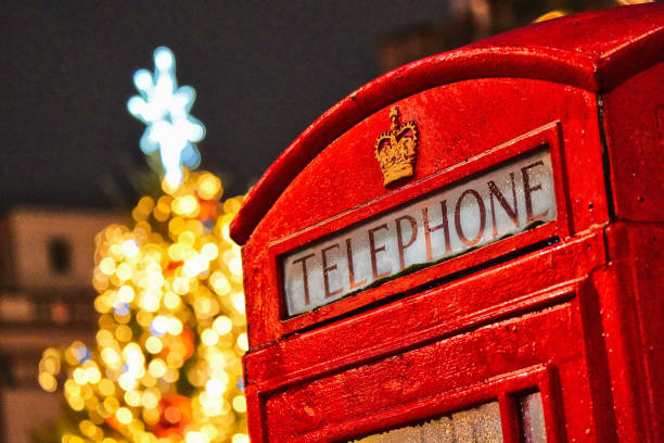 Iconic London red telephone booth under the snow