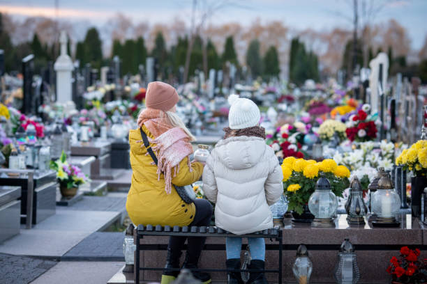 istock Taking a moment for reflection and remembrance in a serene and peaceful cemetery setting 2192538277