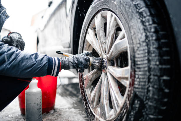 Professional car wash. Wheel cleaning.