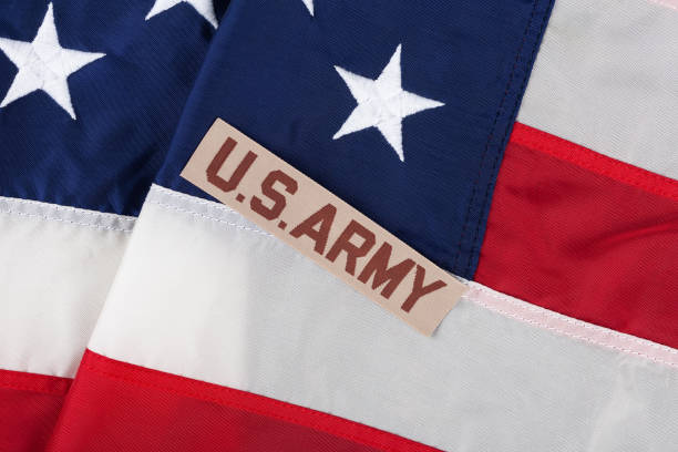 istock US ARMY Branch Tape on national USA flag 2192545721