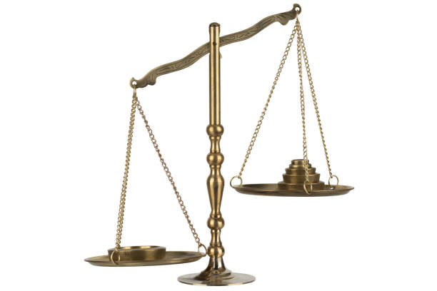 istock Bronze traditional balance scale with weights isolated on white 2192546346