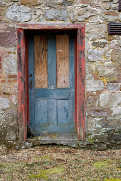 istock doorway on abandoned 1800s house 2192546900