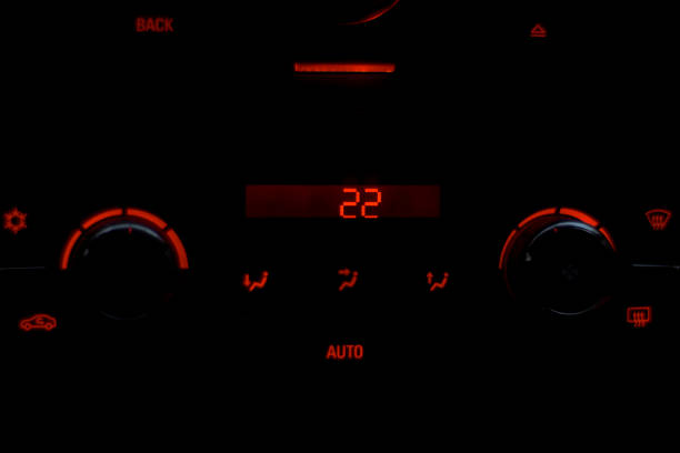 Car air conditioning controls illuminated at night heating air conditioning temperature at 22 degrees