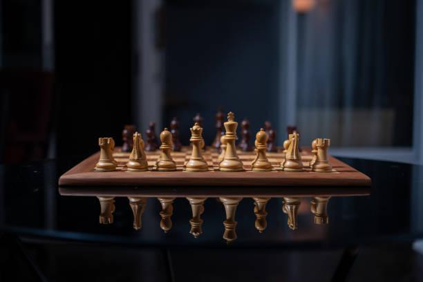 istock Wooden chessboard with chess pieces 2192548208