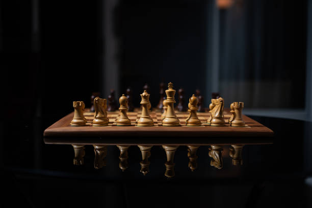 istock Wooden chessboard with chess pieces 2192548209