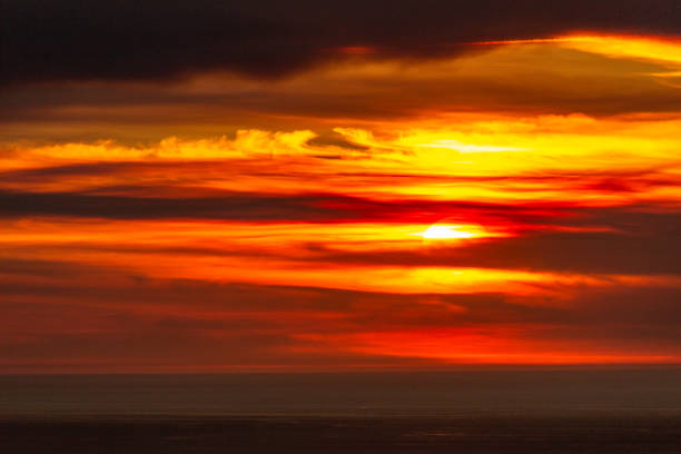 istock Sunset over the Ocean. Dramatic Sky and Sun 2192549443