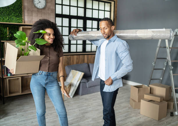 istock A young couple moving into their first home 2192569098