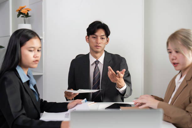 istock Business Team Collaborating in Modern Office Setting for Innovative Idea Exchange and Strategic Planning 2192575264