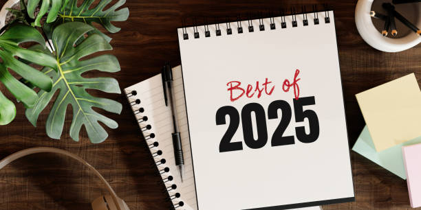 istock Best of 2025 journal on desk with coffee and plants, 3D render. 2192575326