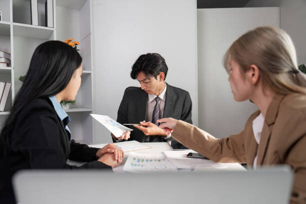 istock Professional Business Team Meeting in Modern Office Setting for Strategic Discussion and Collaboration 2192582284