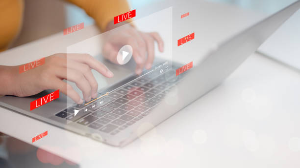 istock Women watching a live stream. Online live stream window. Video streaming on internet concept. Live digital stream multimedia player. 2192584068