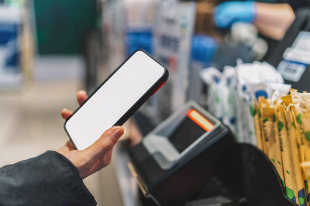 istock Contactless Payment Technology with Smartphone at Retail Checkout 2192591270
