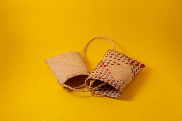 istock Handcrafted African pocket shoulder straw wallets, commonly used in Mozambique, showcasing traditional artisanal craftsmanship 2192592149