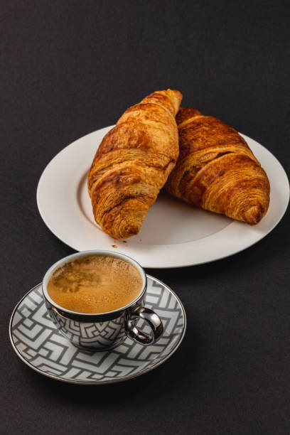 buttery croissants and rich espresso, a delightful pairing perfect for breakfast