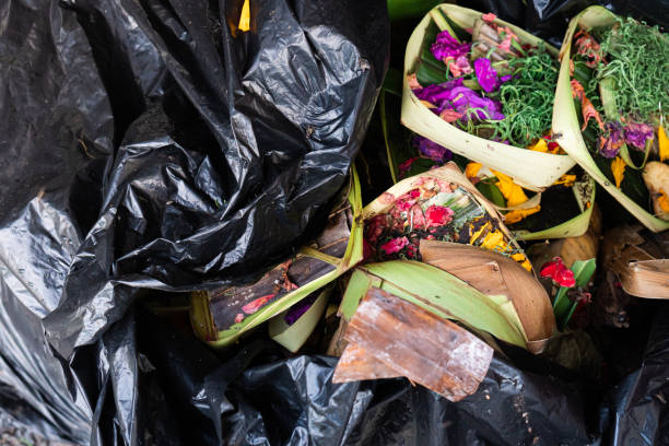 istock Discarded Colorful Offerings in Trash Bag 2192596173