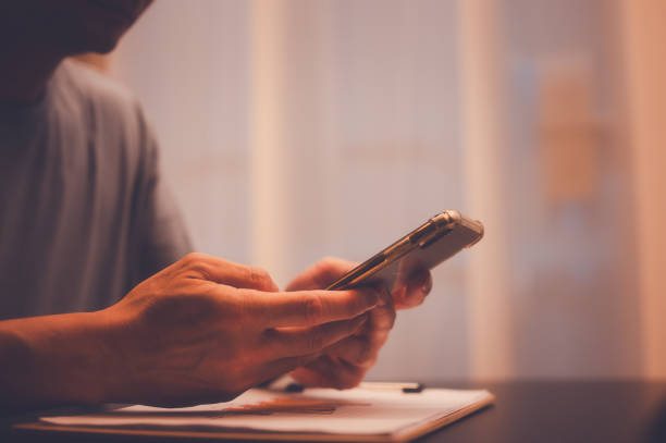 istock Social media marketing concept. man hand using smartphone typing, chatting conversation in chat box icons pop up typing on a phone for communication search networking and texting on a mobile app 2192597139