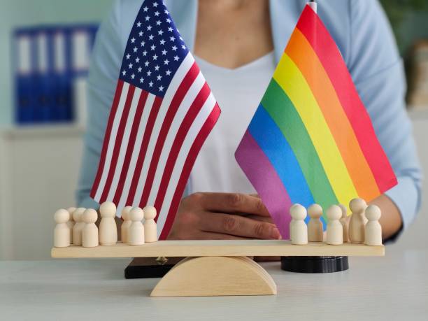 istock Diverse community celebrating unity with flags representing inclusivity and patriotism in an office setting 2192599025