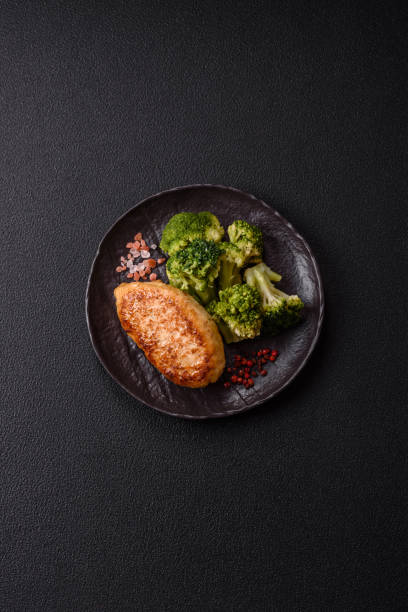 istock Delicious fresh green broccoli steamed in a ceramic plate 2192600593