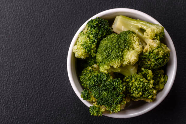 istock Delicious fresh green broccoli steamed in a ceramic plate 2192600705