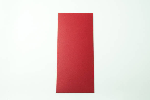 istock Stack of red envelopes gift isolated on white background. Concept for Chinese New Year. Empty blank copy text space. Mock up - cut out image. 2192604701