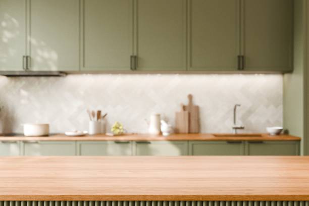 Chic Modern Kitchen with Green Cabinets, countertop and elegant backsplash, creating a tranquil cooking space. 3d render.