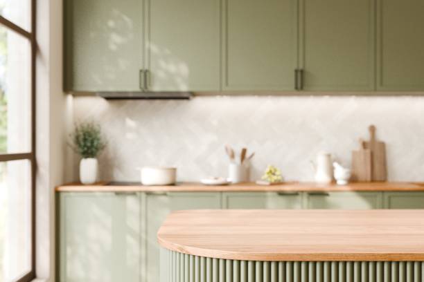 istock Modern Green Kitchen with Wooden Countertop Design. 3d render. 2192608693